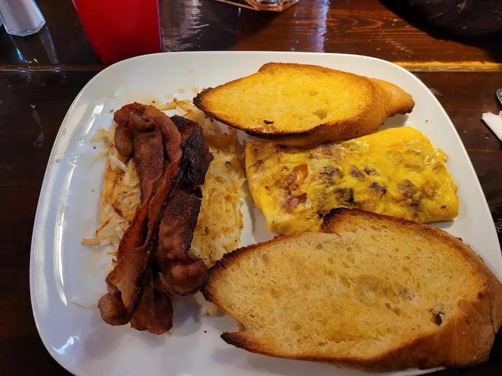 Ham and Cheese Omelet Side of Hash Brown's Side of Bacon